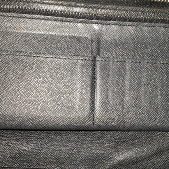 LV Taiga Black Leather Vertical Zippy Wallet